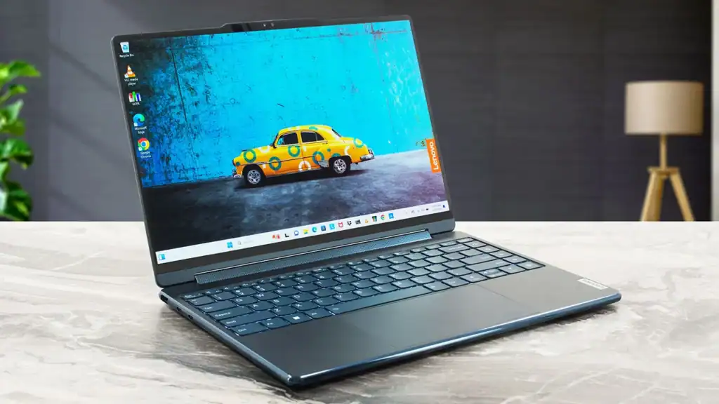 Lenovo Yoga AI laptop with slim bezel display on desk